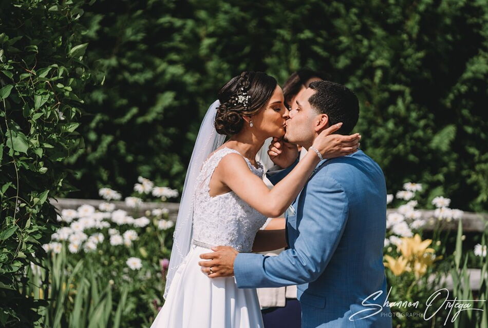 Bride and groom kissing